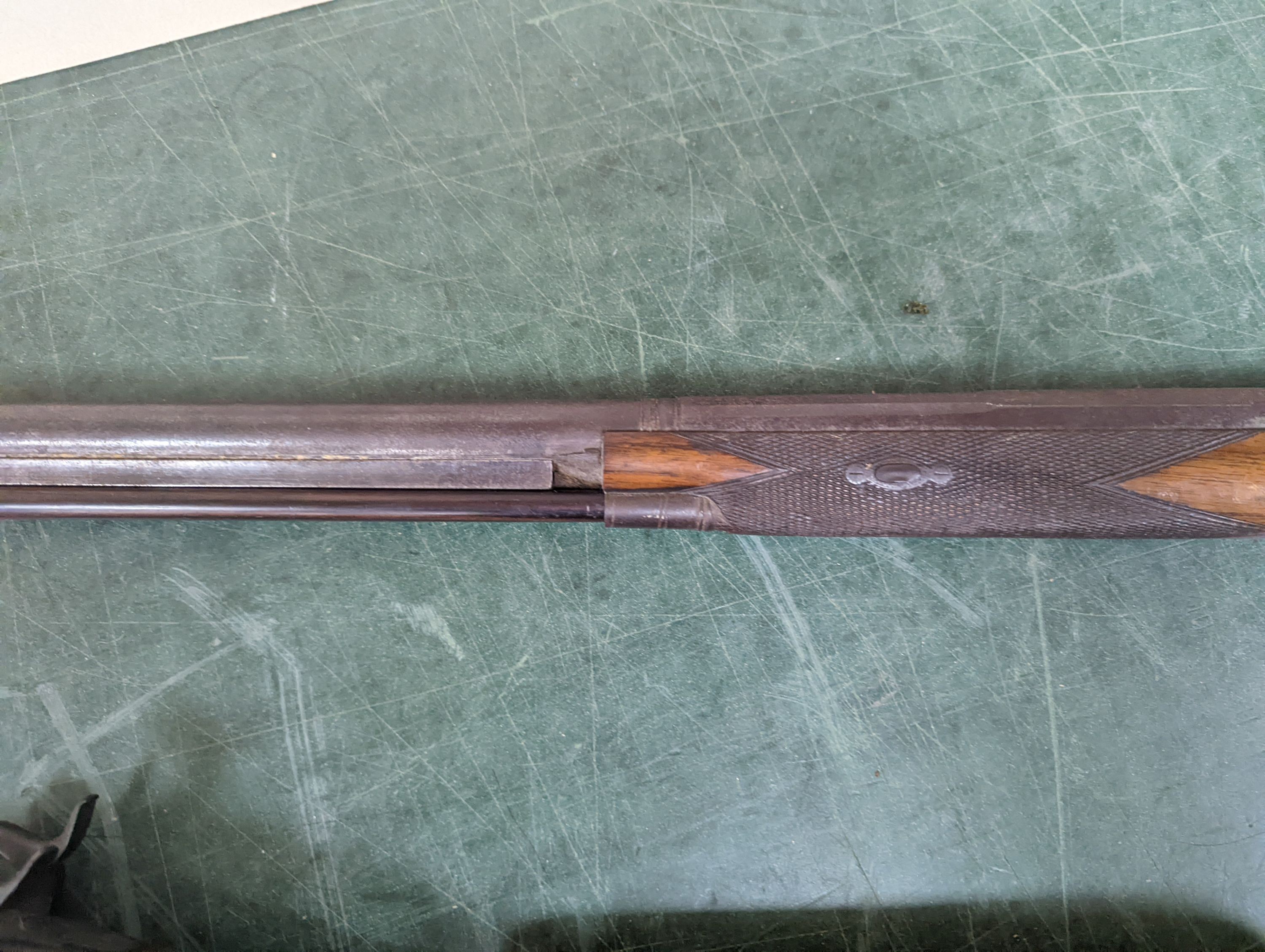 Two 19th century percussion muskets, 103cm. max., one double-barrelled